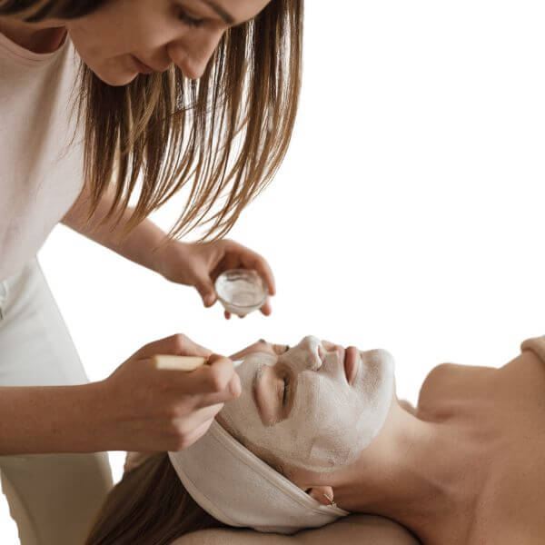 lady getting a relaxing facial